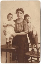 Real Photo Postcard RPPC 1921 Holland Two Boys with their Young Mother