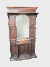 porte manteau en chêne massif finement sculpté miroir biseauté . XX siècle .