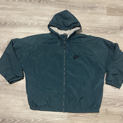 dark green nike windbreaker