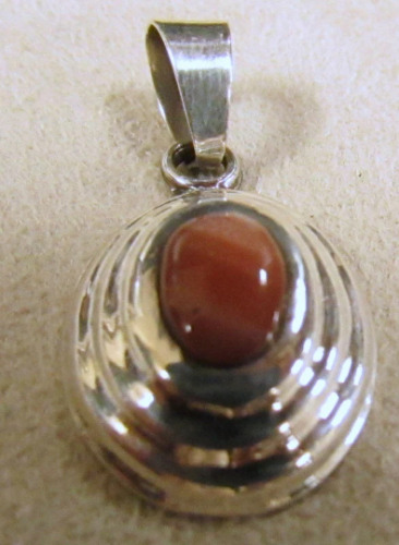 Sterling Silver and Pink Stone Oval Pendant +