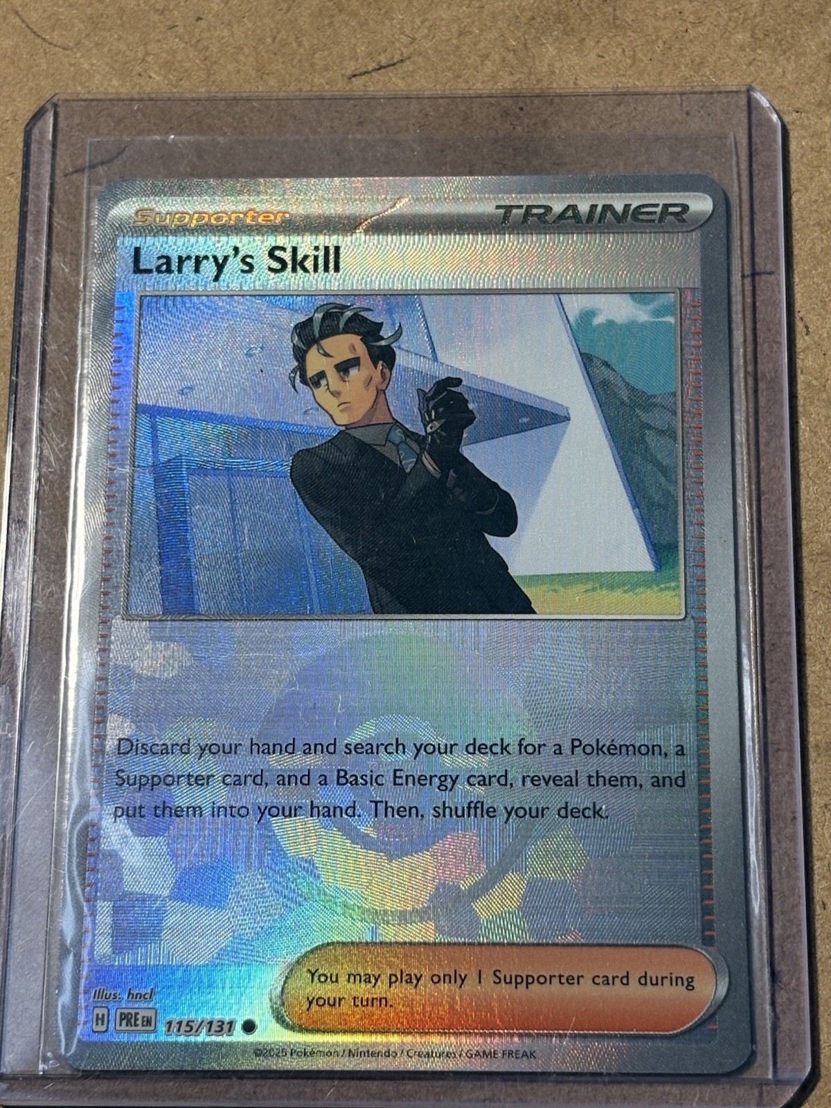 Larry's Skill - (Poke Ball Pattern) 115/131 Sv: Prismatic Evolutions Holo