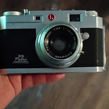 Petri 35 Silver Rangefinder 35mm Film Camera w/ 4.5cm f/2.8 Lens  Case