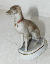 CHIEN ASSIS FIGURINE EN PORCELAINE