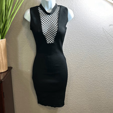 #579 Fashion Nova black body con fishnet juniors size small
