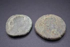 Two chunky ancient Roman coins, Faustina and Antoninius Pius