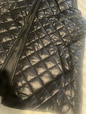 Ladies Adults Sleeveless Gilet medium length Wet Look Quilted Padded Coat Black