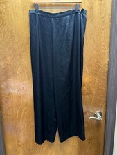 Women "St. John " black satin pant. Zipper on left size. Size 8 Prev. Owned