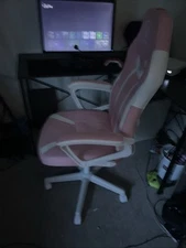 Pink/White pro gaming chair with adjustable headrest and lumbar support