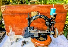 Willcox  Gibbs Chainstitch Automatic Silent sewing machine 64,wood case c.1900