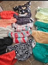 15 bumgenius all in one cloth diapers, wet bag and cleaning nozzle.