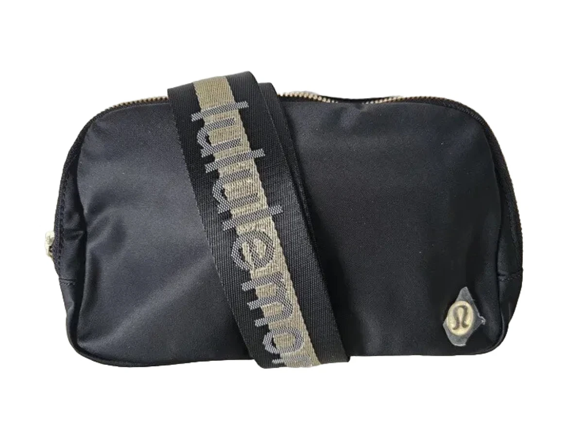 Black and top gold belt bag