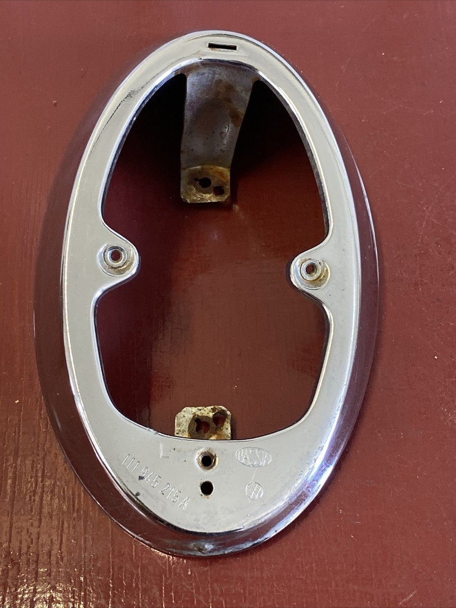 1962 - 1966 VW BEETLE BUG LH CHROME TAIL LIGHT HOUSING 111935215A 