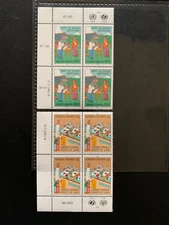 UNITED NATIONS, Vienna # 76 and 77 MNH Inscription Blocks of Four