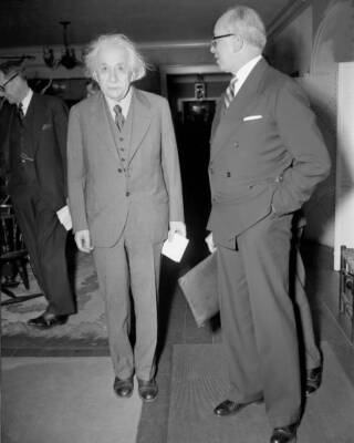 Dr Albert Einstein chats with Lewis L Strauss president of the boa .. Old Photo