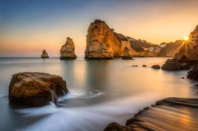 Sonnenuntergang am Strand von Praia da Rocha in Lagos, Portugal (211599611)