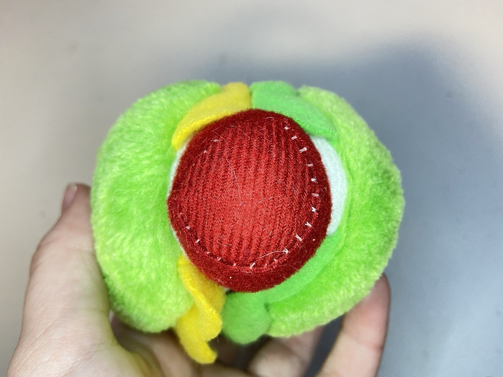 USED plush dog toy - squeaker doesn't work - green hot dog
