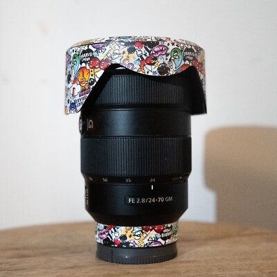 Sony G-Master 24-70mm f/2.8 Lens   Excellent Condition + Alphagvrd Skin