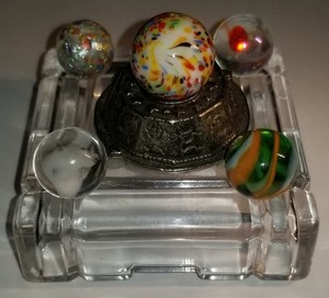 5 Collectible Marbles. 