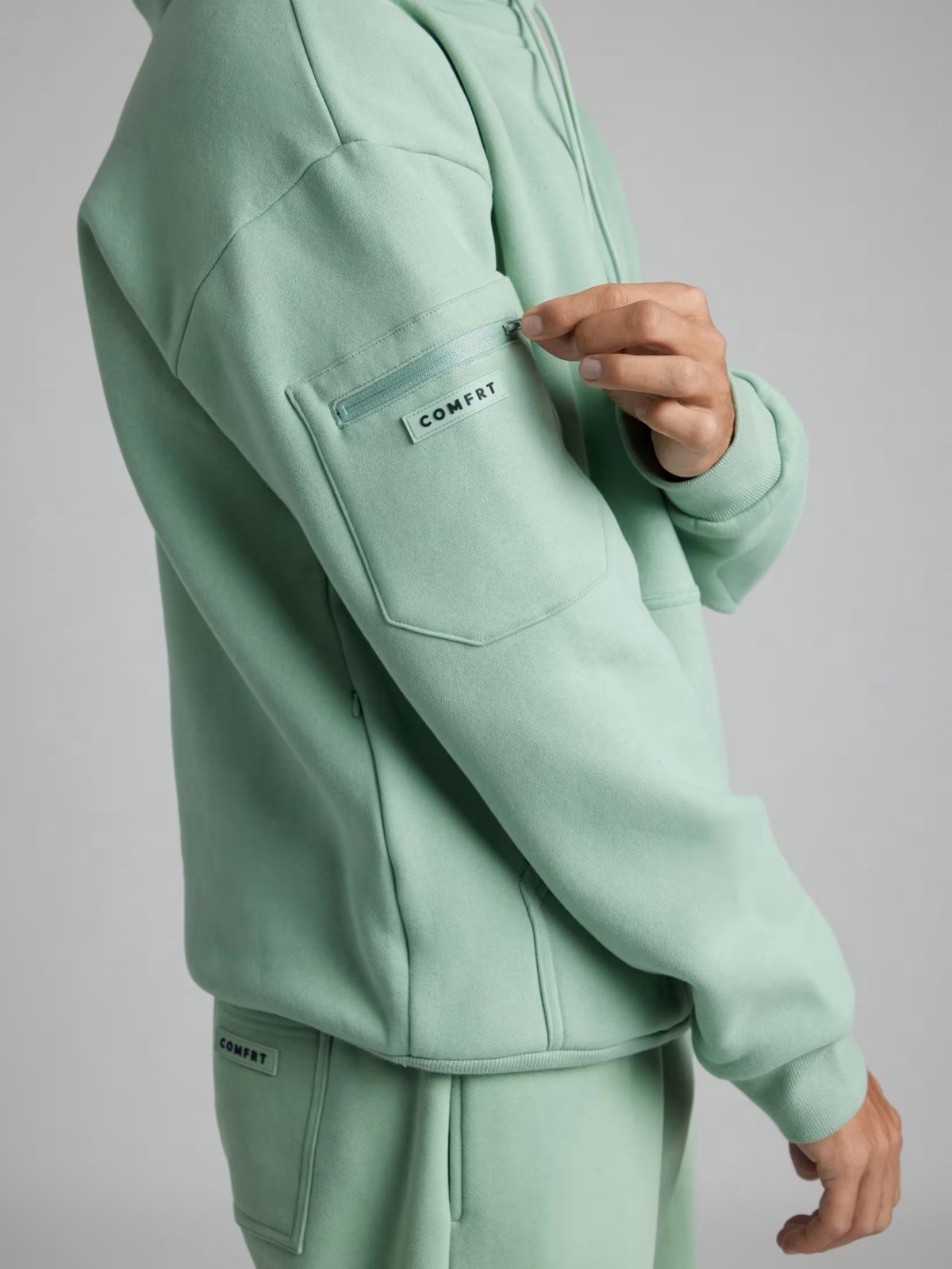 Brand New In Bag Comfrt Airplane Mode Hoodie, Sleep Mask, Size 2XL, Aloe