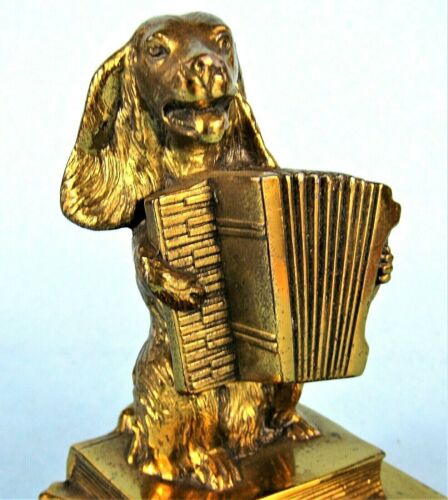 FERMALIBRI VINTAGE JENNINGS BROTHERS COCKER SPANIEL CANE CHE SUONA FISARMONICA METALLO - Foto 2 di 11