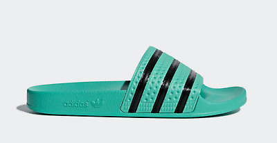 adidas green flip flops