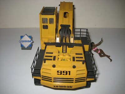 Miniature Conrad 1:50 - Excavatrice Liebherr R 991 Sur Chenilles Hautes, Avec Boîte