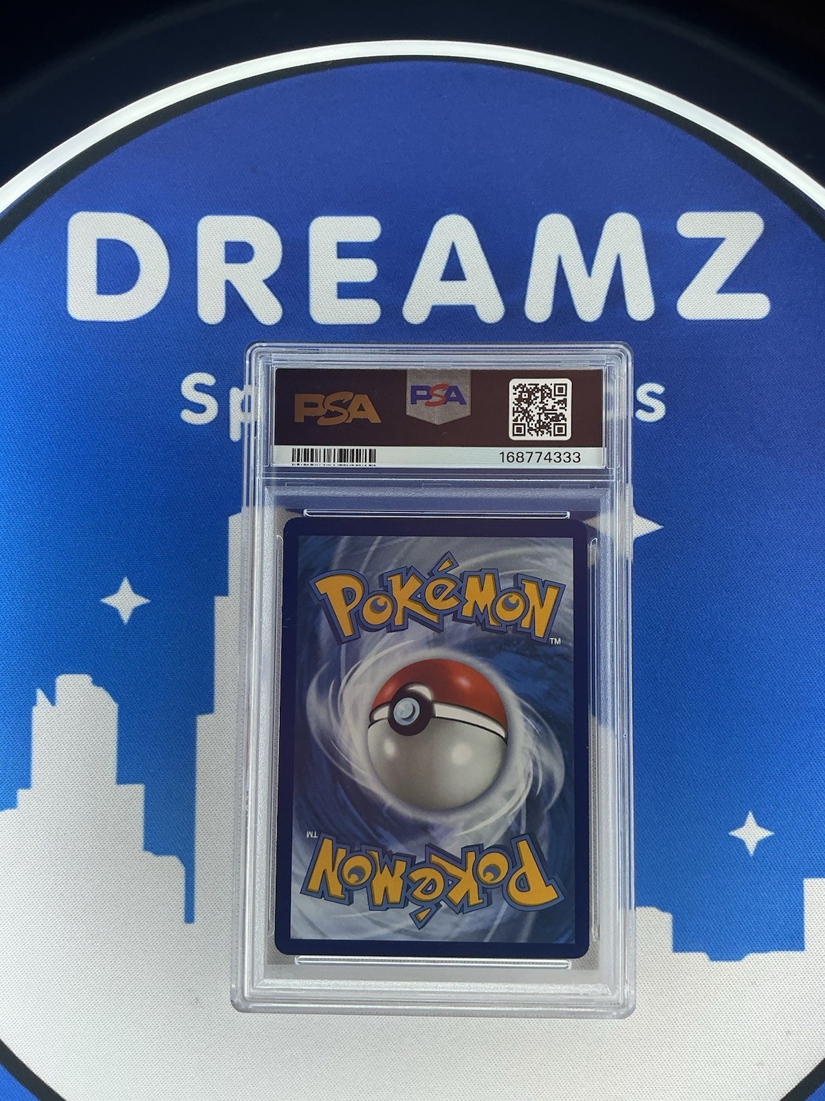 2025 Pokémon WHT EN Scrafty #058/086 holo card with silver border, PSA graded DreamZ Spacetime in protective case.