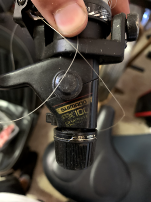 Vintage SHIMANO FX100 Graphite Ultra Light Spinning Reel - Fishing