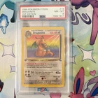 Wizards of the Coast 1999 Pokemon Fossil Dragonite Holo 1st Ed PSA 8 #19/62