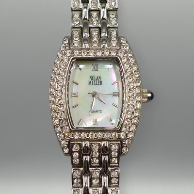 Nolan Miller Ladies Quartz Mother of Pearl Dial Synthetic Stone Accented Watch