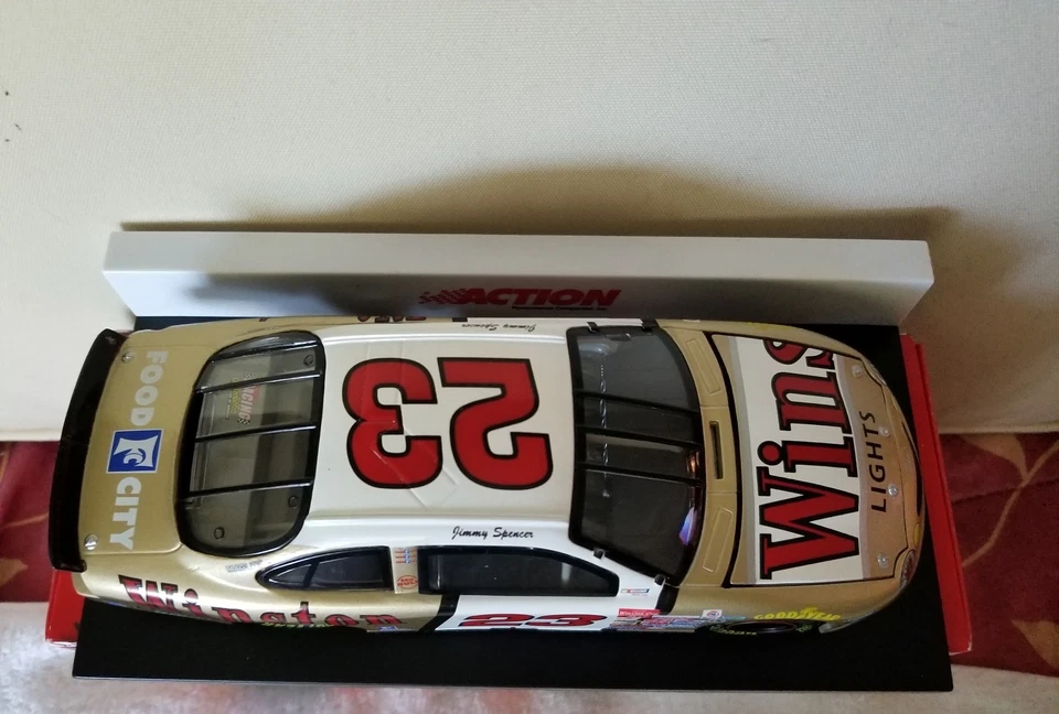Banco de monedas Tauro 1999 Winston Gold 1999 Action Nascar Jimmy Spencer escala 1:24 #23 Foto 4 de 4