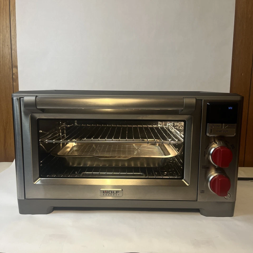 Wolf WGCO170SR Elite Arbeitsplatte Backofen Umluft mit silbernen & roten Reglern. SAUBER!