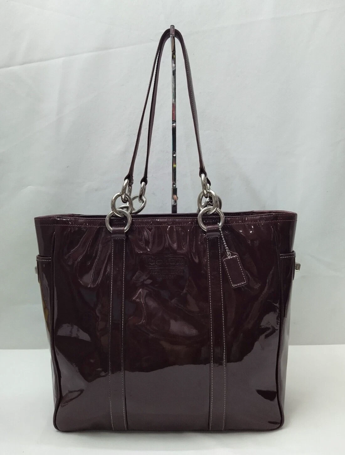 Borsa tote Coach Galaxy viola prugna in pelle verniciata tasca tunlock doppio manico