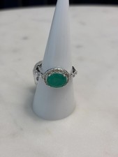 Silver Tone Ring with Green Oval Stone and Clear Accents