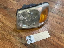 03 04 05 06 07 08 09 GMC Envoy Denali drivers side headlight ay11873