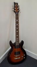 LAG Roxane R200 2008  Set Neck with EMG pick ups. Includes a quality  soft case.