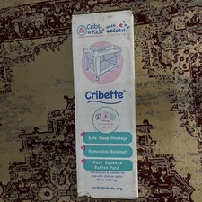 New Cribs for Kids Cribette portable playard with wheels in compact travel bag