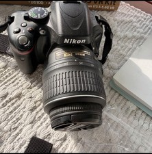 Nikon D5100 DSLR Digital Camera Video 18-55mm VR Lens - Bundle - Battery Charger