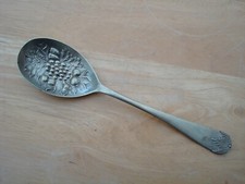 SILVER COLOURED METAL REPOUSSE STYLE FRUIT DECORATED SPOON APPROX. 8.5" LONG