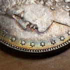 1885 $1 MORGAN SILVER DOLLAR, RAINBOW RIM TONING *UNC COIN* LOT#V170