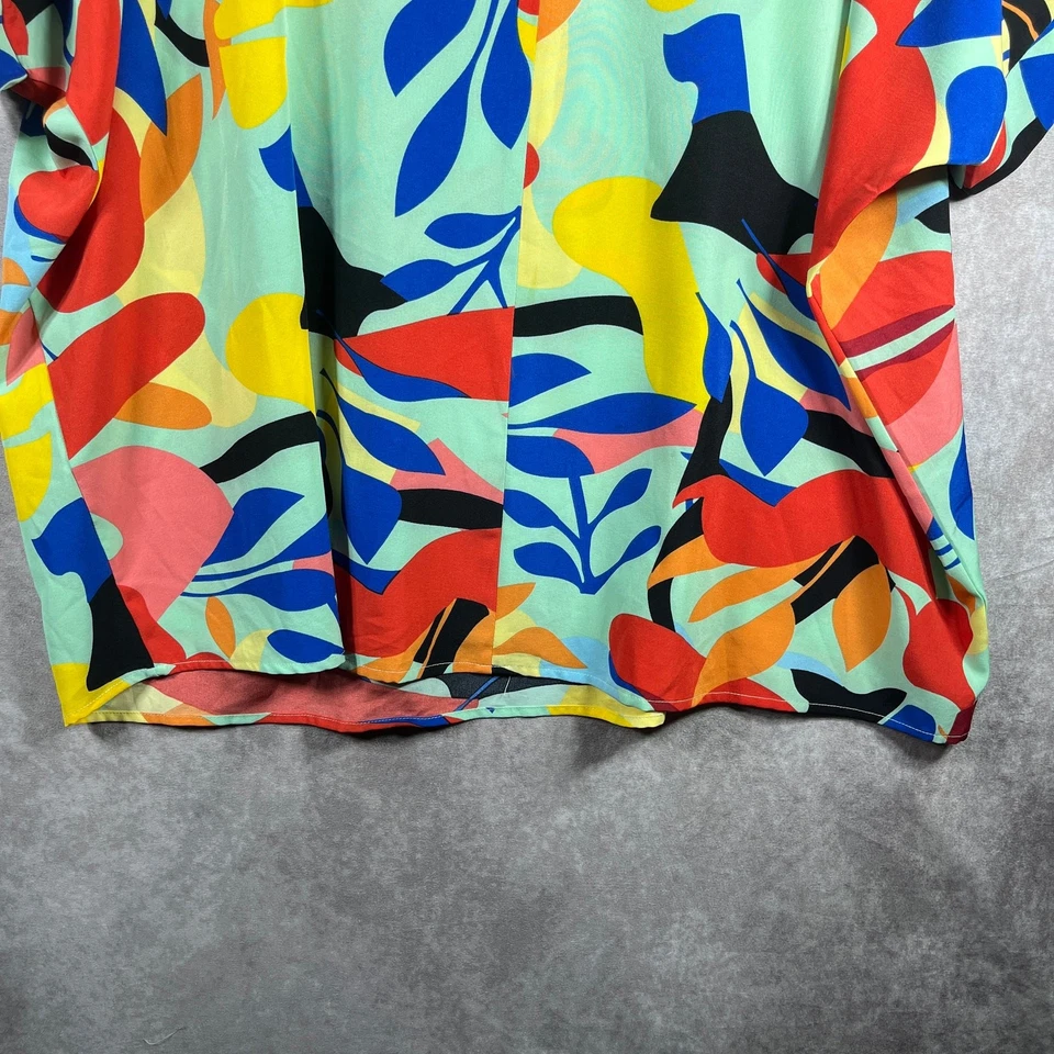 Blusa Jodifl para mujer 1X multicolor estampado de hojas mangas Dolman cuello en V colorida divertida Foto 3 de 4