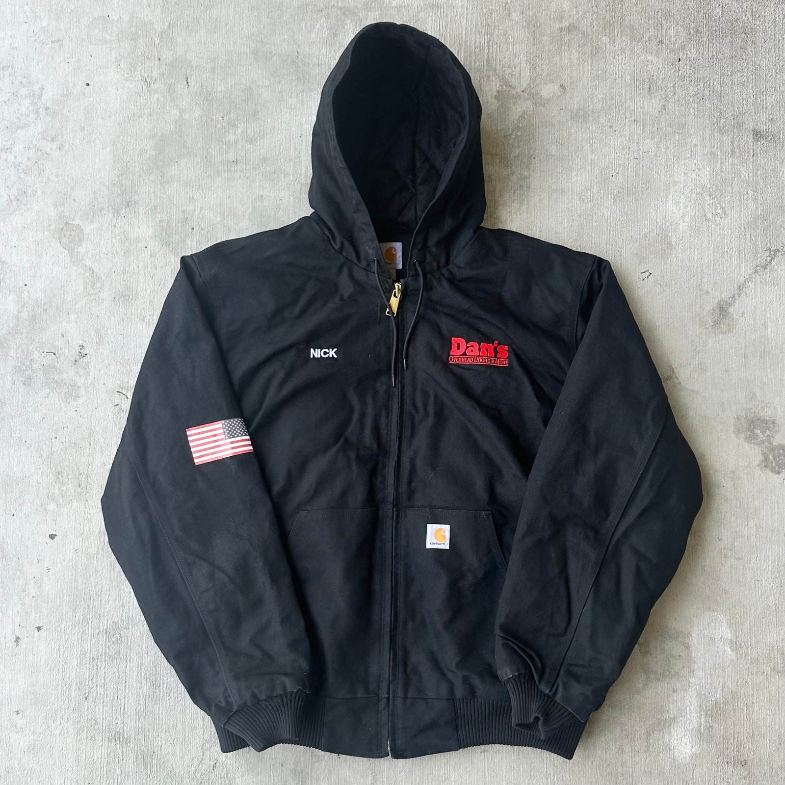 Vintage Y2K black Carhartt quilt-lined hooded work jacket