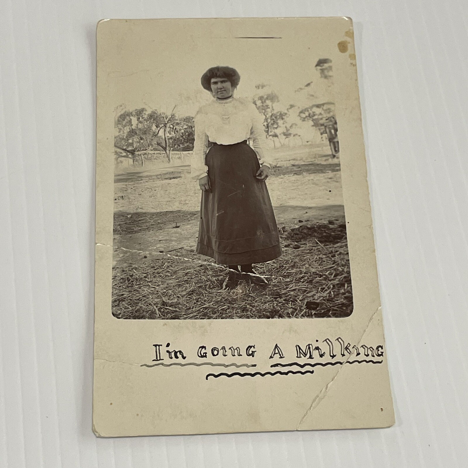 Vintage Sepia Photograph Postcard Woman ‘I’m Going A Milking’ In Farmyard