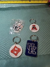 4 NEW SPIRTS KEY RINGS NSE, UK, CRIMSOM TIDE, AND Wolfpack Bag A