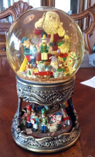 Vintage  Santa  s Coming " Musical Spinning Snow Globe with Metal Base