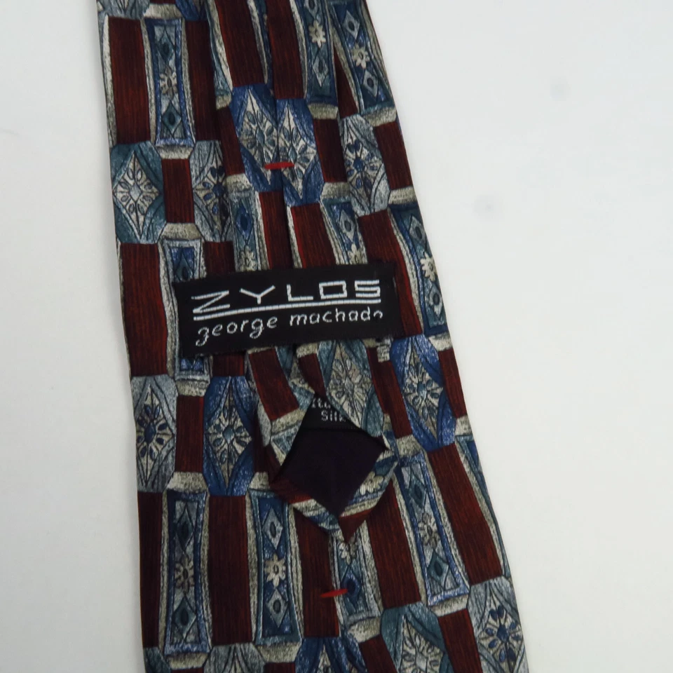 Corbata de cuello de seda para hombre George Machado Zylos rojo azul estampado geométrico 58x4 Foto 3 de 4