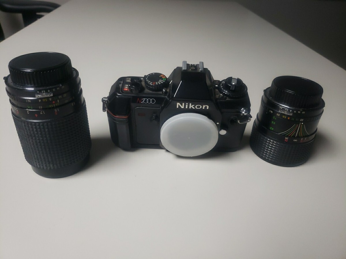 Nikon N2000 35mm Film Man Focus SLR Camera Body Black (AS-IS) Parts Only  Lens