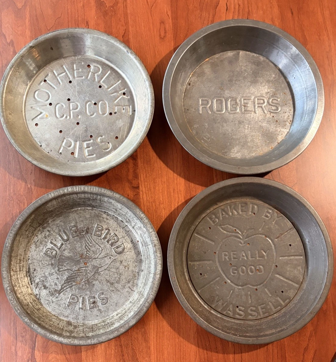 Vintage Metal Advertising Pie Plate Set of 4 Motherlike Rogers BlueBird Wassell
Opens in a new windo