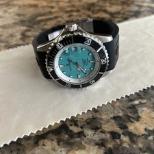 Revue Thommen's Men's Diver Green Dial Rubber Strap Automatic Watch 17571.2331