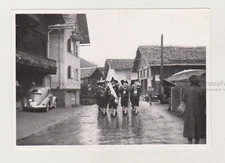 Musical Orchestral Band Parades Through The City In Carnival Mask Snapshot Photo